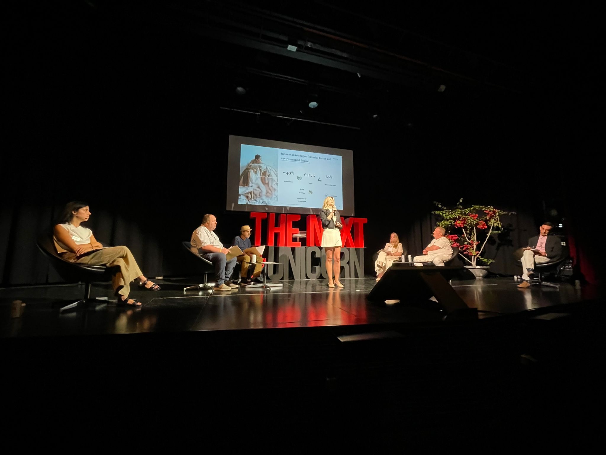 Anna Warchalowska pitching at the Next Unicorn competition